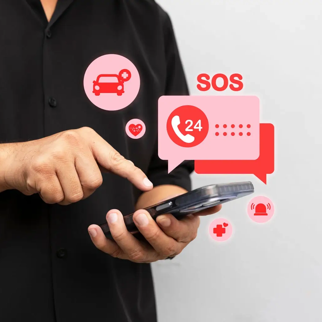 Hand holding smartphone, emergency services displayed